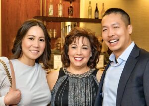 Maria Smith, CEO of Harbor House of Louisville and Di Tran CEO of Louisville Beauty Academy and his wife Vy Truong