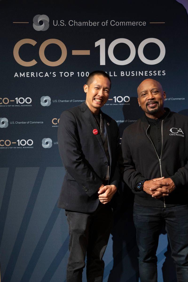 Di Tran standing at a U.S. Chamber of Commerce CO-100 event backdrop